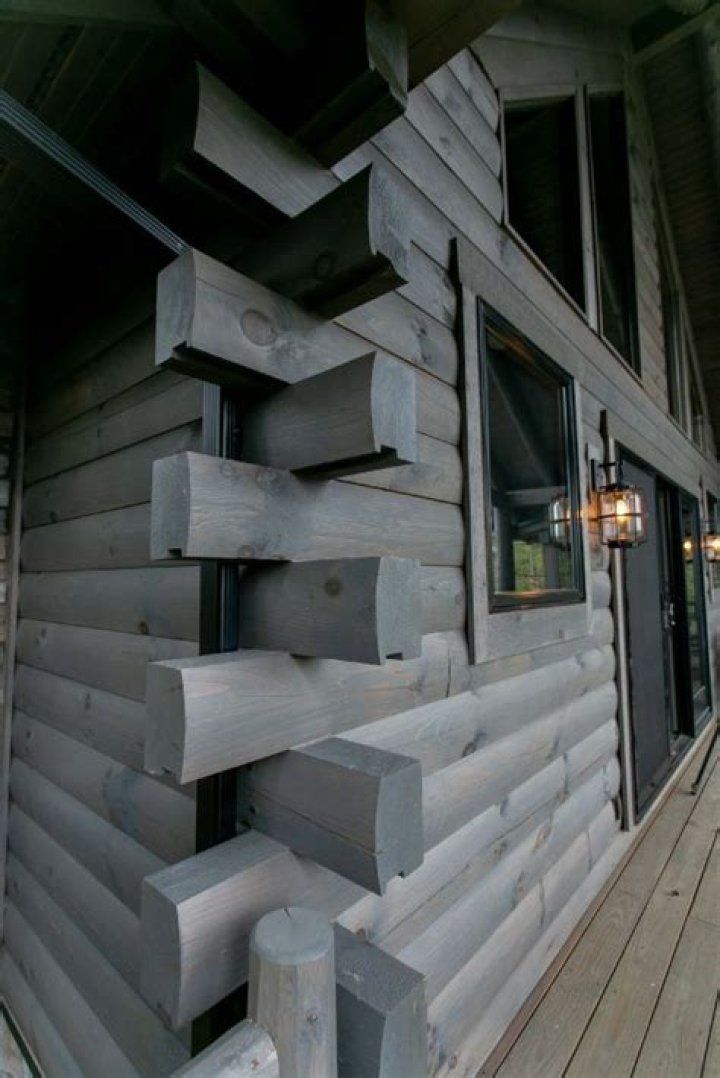 Can a log cabin be painted?