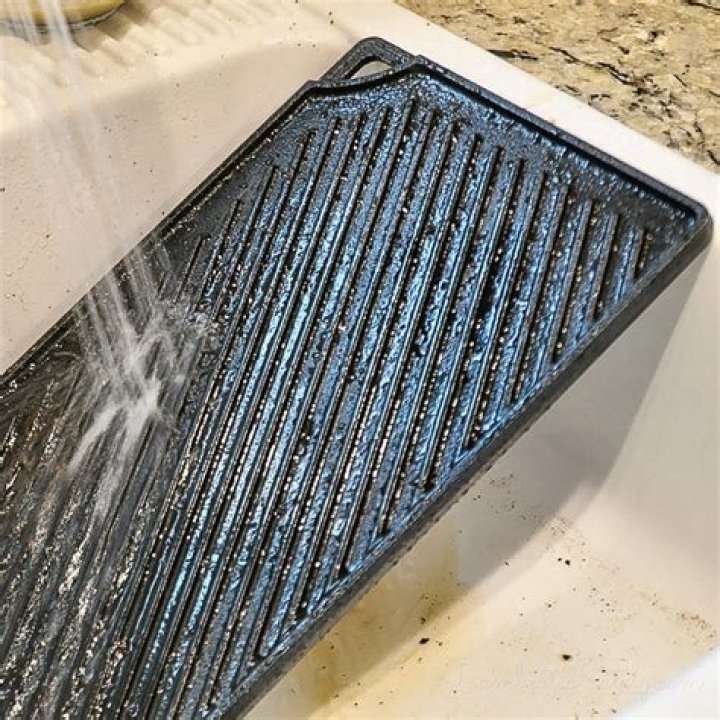 How do you clean a cast iron griddle stove top?