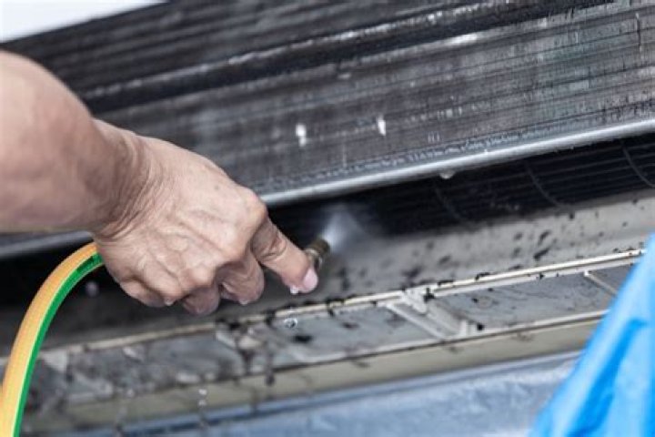 How do you clean a cooler coil?