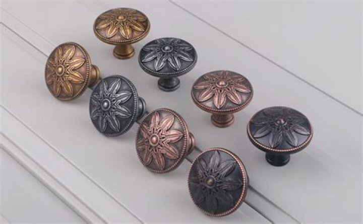 How do you clean old cabinet hardware?