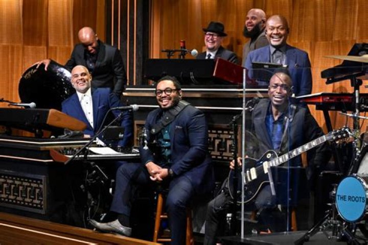 Who is the white guy in the Roots Band?